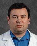 Dr. Alberto Alzate, MD