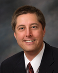 Dr. Alan Dacre, MD