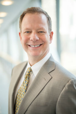 Dr. Alexis Olsson
