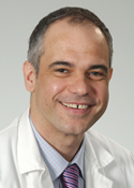 Dr. Nigel Girgrah, MD, PHD