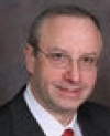 Dr. Irving Strauchler, MD