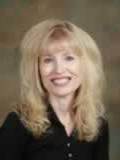 Dr. Teena Hughes, MD