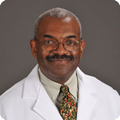 Dr. Wilfred Raine, MD