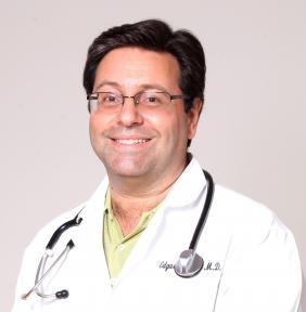 Dr. Edgar Caro, MD