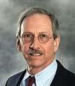 Dr. Maxwell Plesset, MD