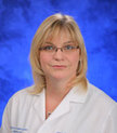Dr. Christie Travelute, MD