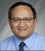 Dr. Wilfredo Curioso, MD