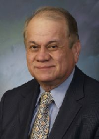 Dr. Luis Bustos, MD