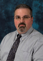 Dr. Charles Roche, MD