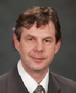 Dr. Adrian Palmer, MD