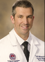 Dr. Travis Dumont