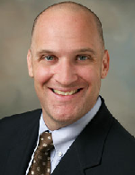 Dr. Travis Hecker, MD