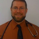 Dr. Jason Komasz, MD