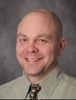 Dr. Eric Tuchscherer, MD