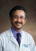 Dr. Mehmet Okcu, MD