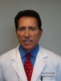 Dr. Gustavo Arriola, MD