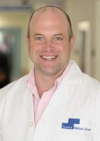 Dr. Christian Menard, MD, PHD