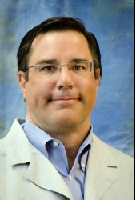 Dr. Trevor Lewis, MD