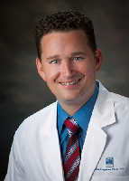 Dr. Curtis Malcom, MD