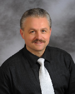Dr. Adam Milik, MD