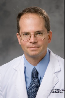 Dr. Christopher Manik, MD