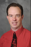 Dr. Christopher Whitty, MD, PHD