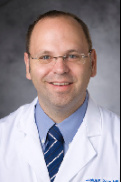 Dr. Justus Roos, MD