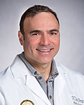 Dr. Claude Sirlin