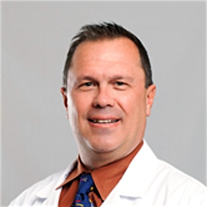 Dr. Eugene Schnitzler, MD