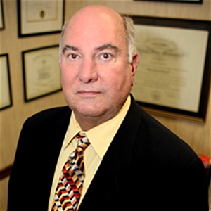Dr. Angus Phelts, MD