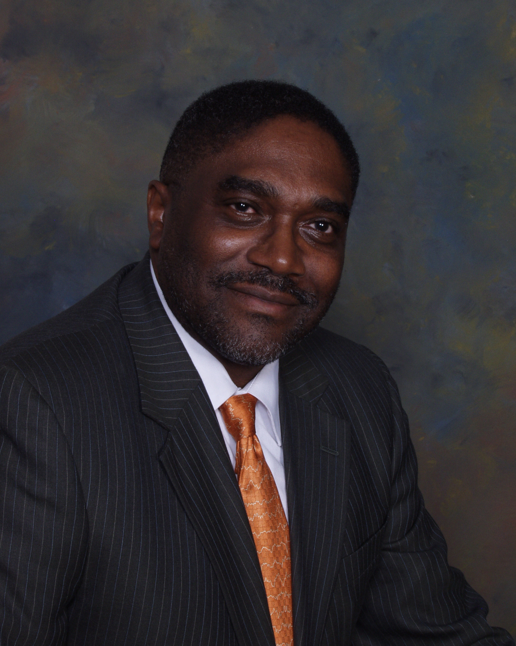 Dr. Cornelius Mance, MD