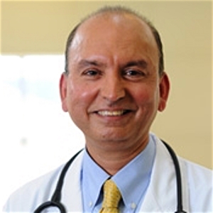 Dr. Vijay Rajan