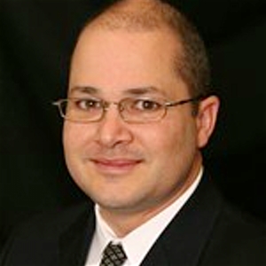 Dr. Carlos Vassaux, MD