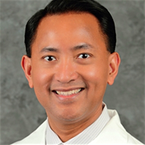 Dr. Alain Flores, MD