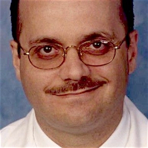 Dr. Dennis Cortes, MD