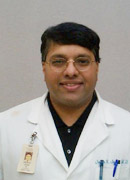 Dr. John John, MD
