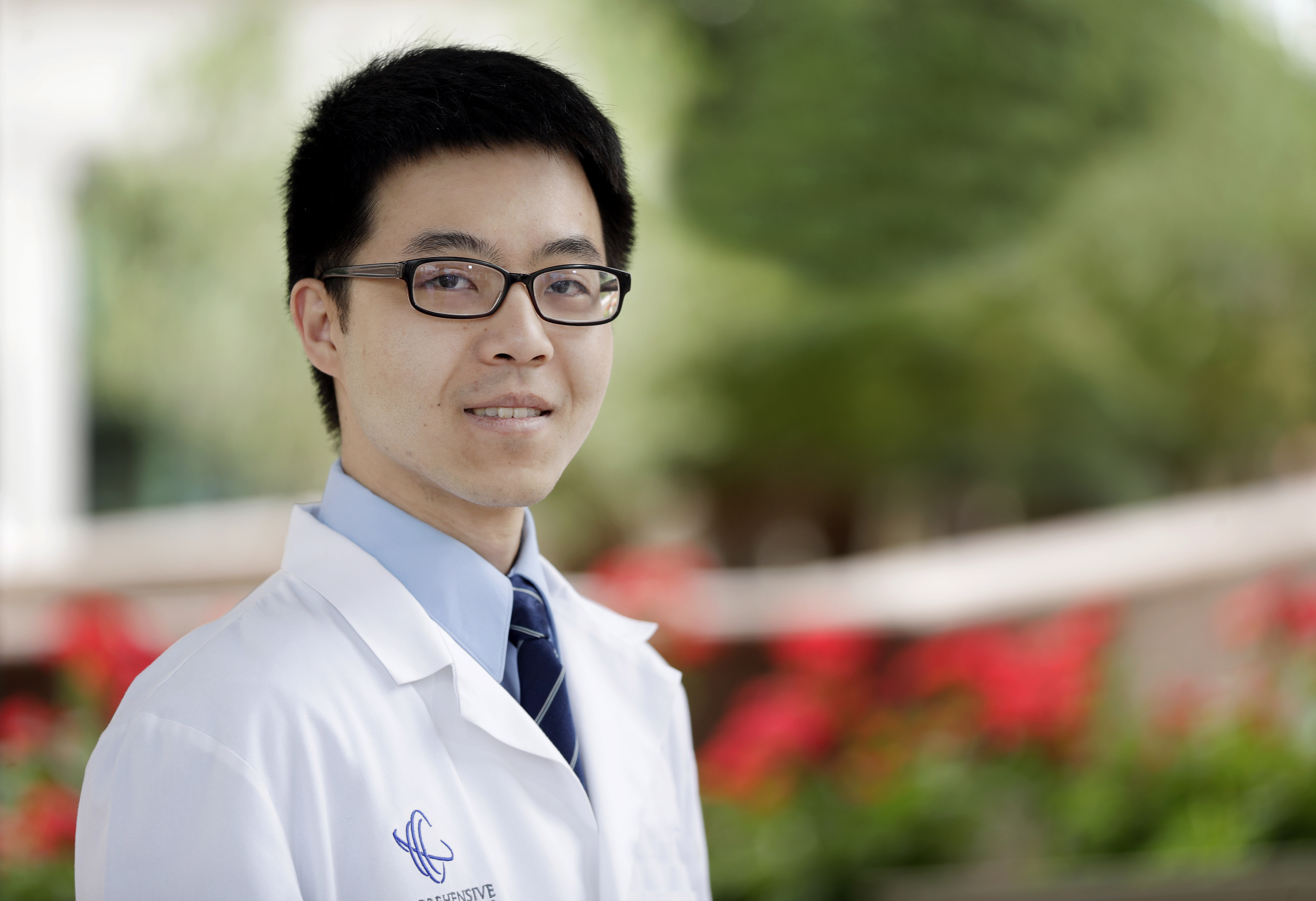 Dr. Wei-Gang Wang, MD