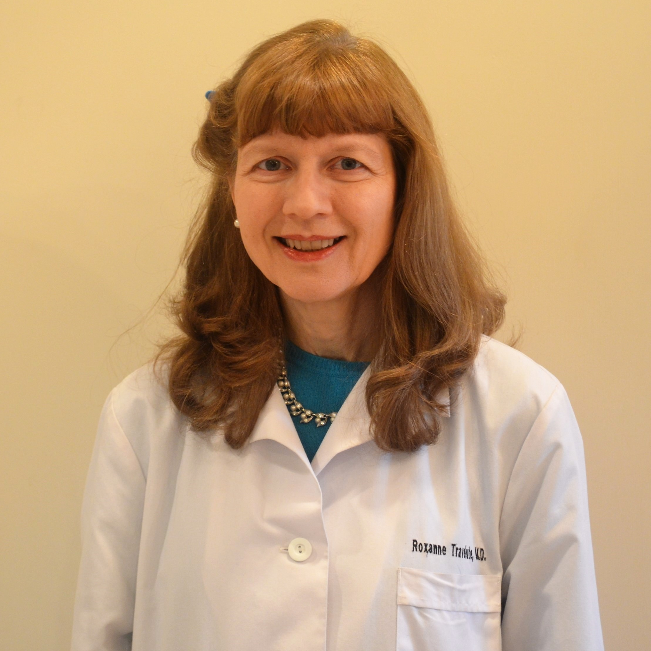 Dr. Roxanne Travelute, MD