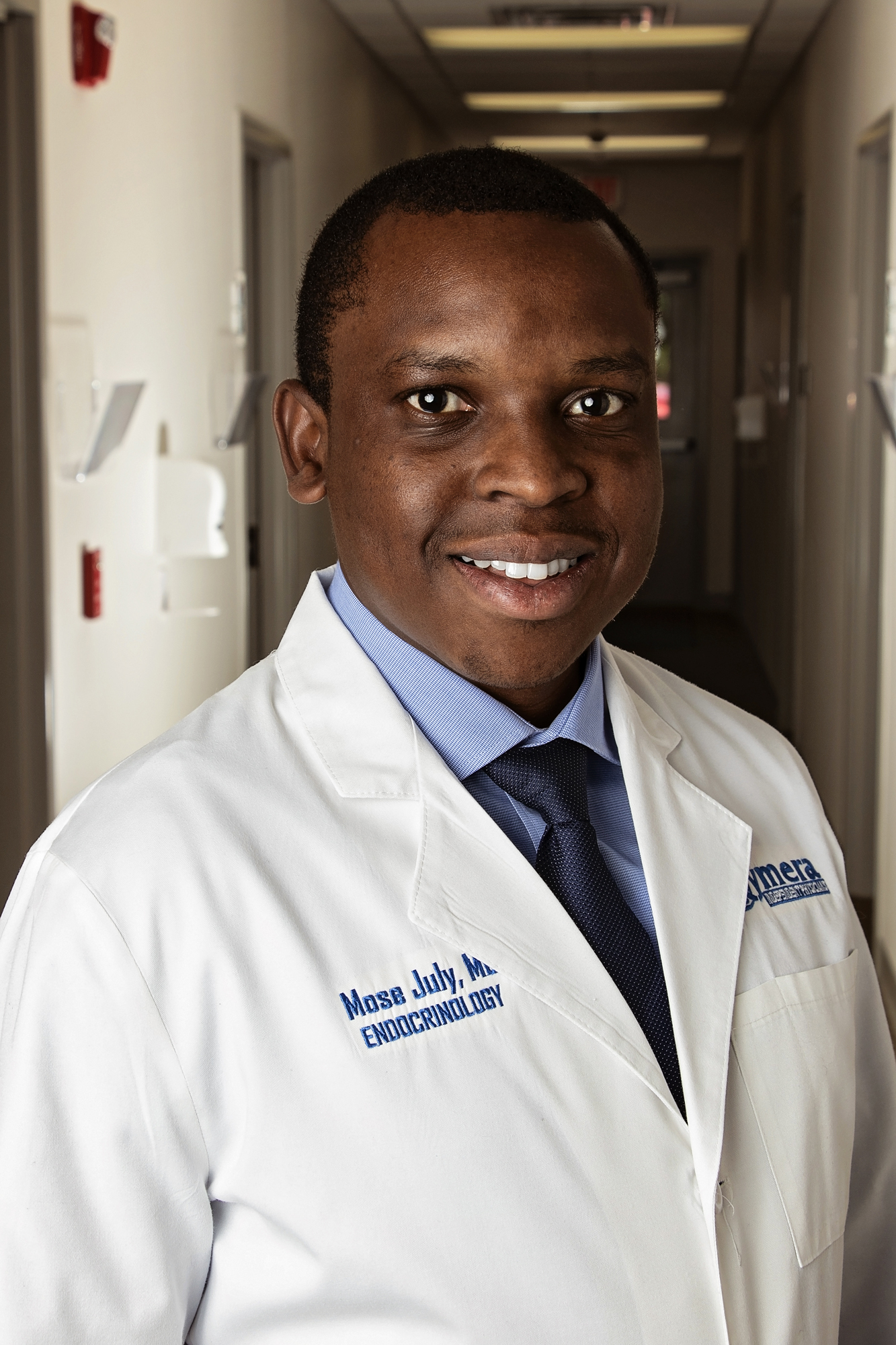 Dr. Mose July, MD