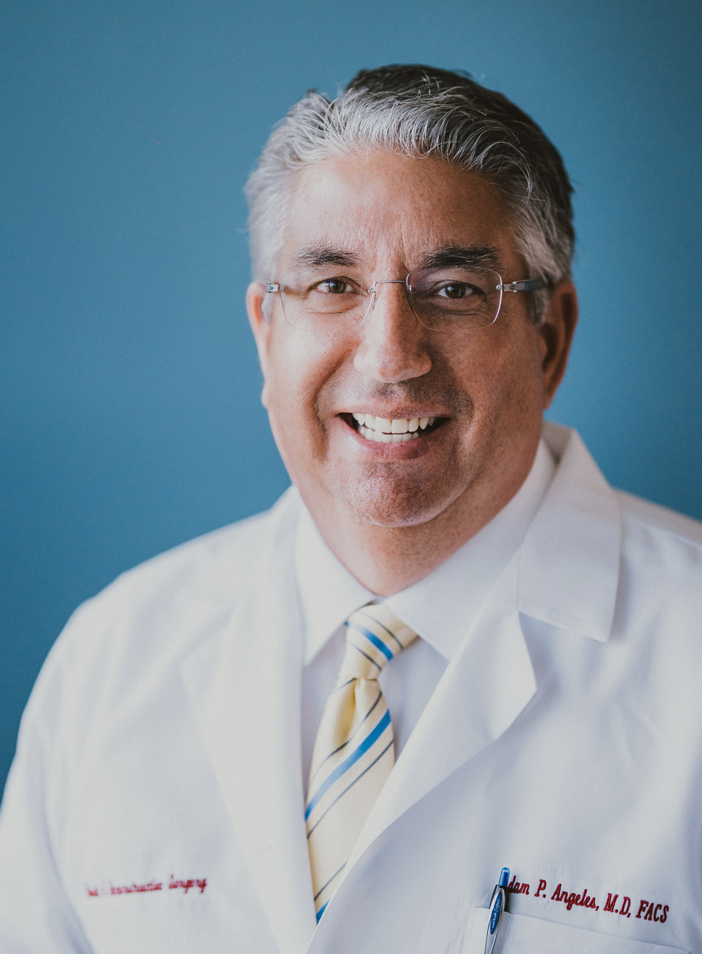 Dr. Adam Angeles, MD