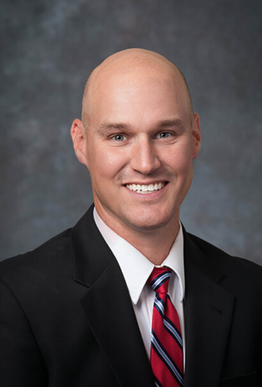 Dr. Travis Wiggins, MD