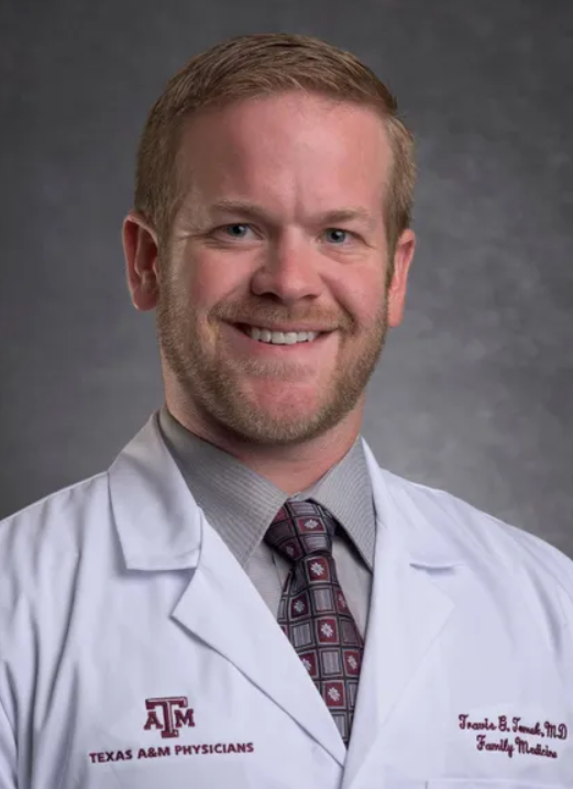 Dr. Travis Tomek, MD