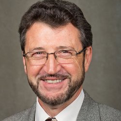Dr. Arnold Traynis, MD