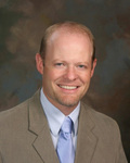 Dr. Darren Brucken, MD
