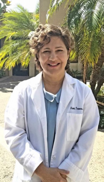 Dr. Naomi Travers