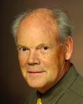 Dr. John Lloyd-Still, MD