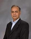 Dr. Kumudchandra Shah, MD