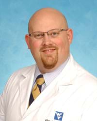 Dr. Alan Thomay, MD