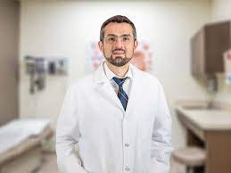 Dr. Andrei Scherer, MD
