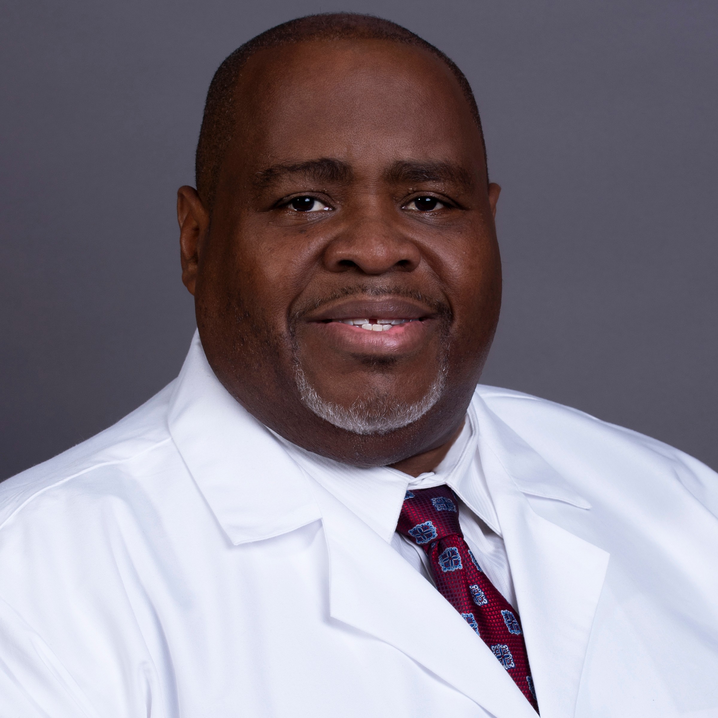 Dr. Claude Scott, MD